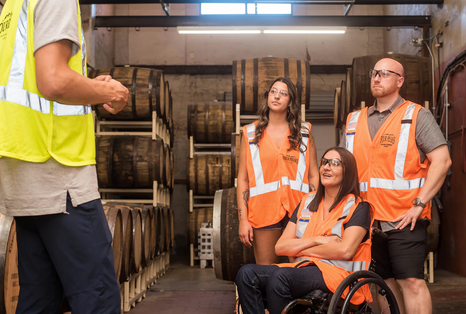 Team in orange safety vests during a site walkthrough